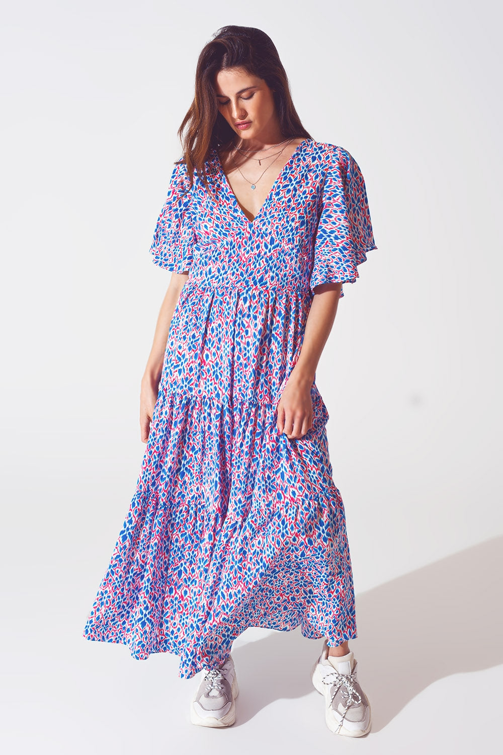 Robe longue avec dos ouvert et lien à nouer dans un imprimé violet