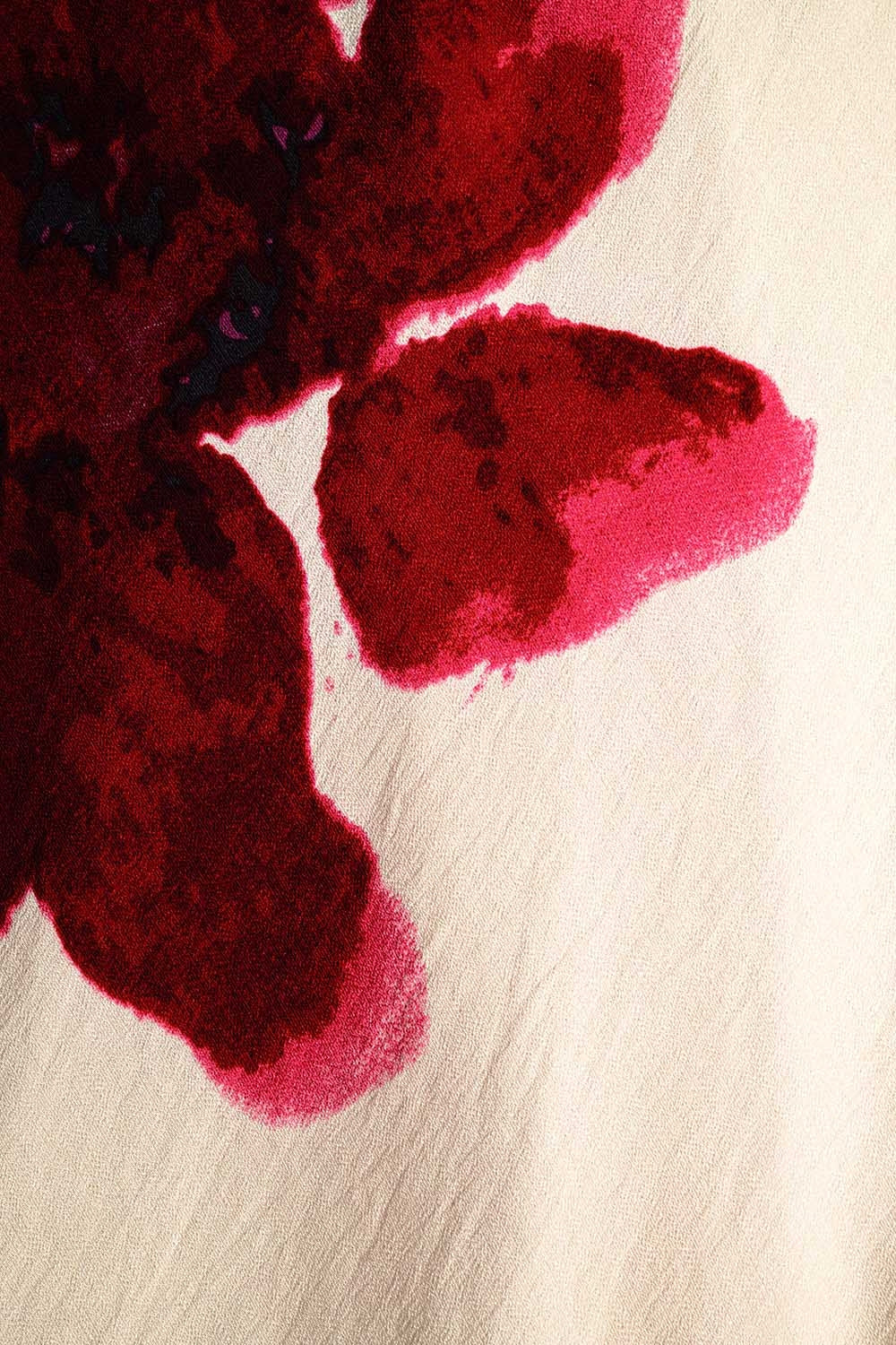 Robe longue fluide sans manches à imprimé floral