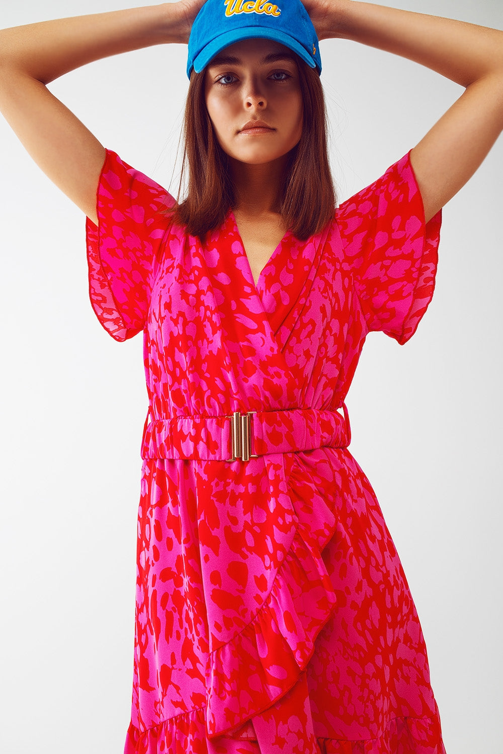 Robe mini avec imprimé animal ceinture et coupe croisée en fuchsia