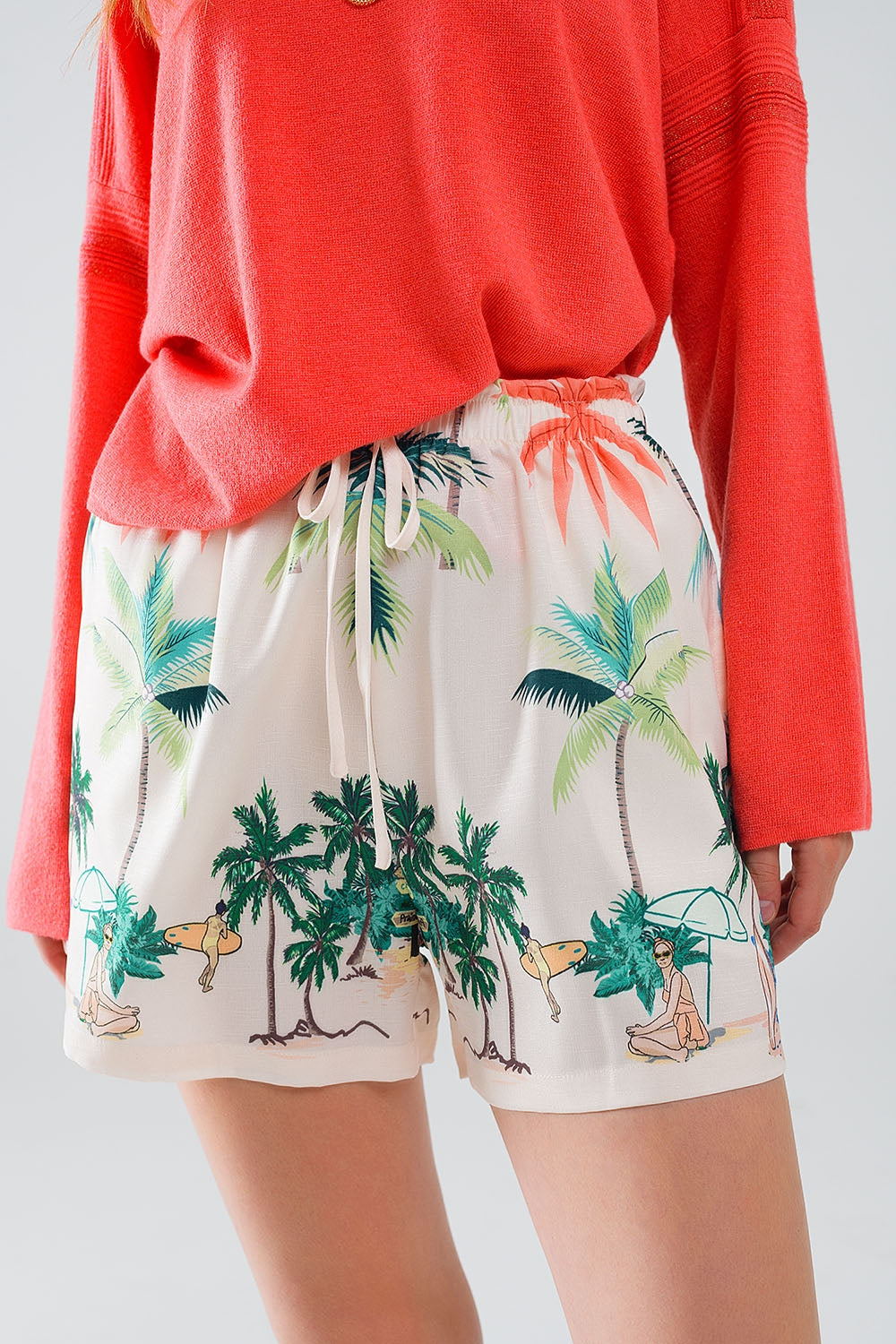 Short crème avec imprimé plage et taille élastique