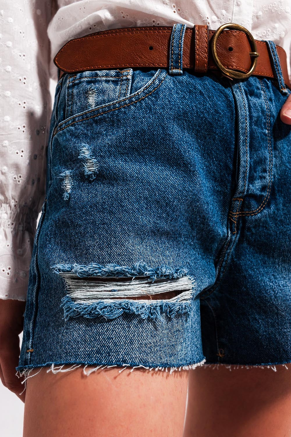 Short en jean à taille haute et déchirures Délavage moyen