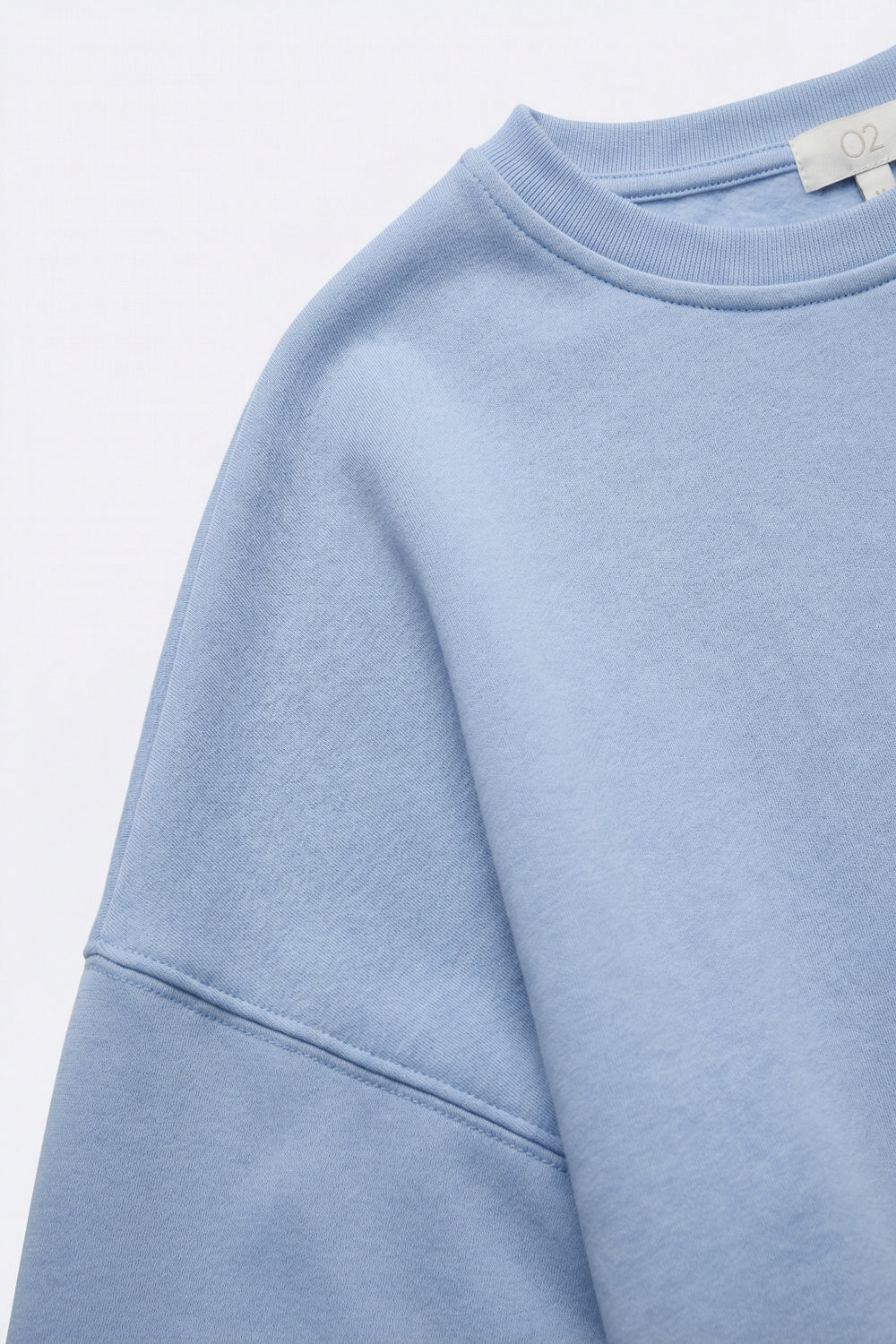 Sweatshirt basique à col ras du cou et épaules tombantes en bleu