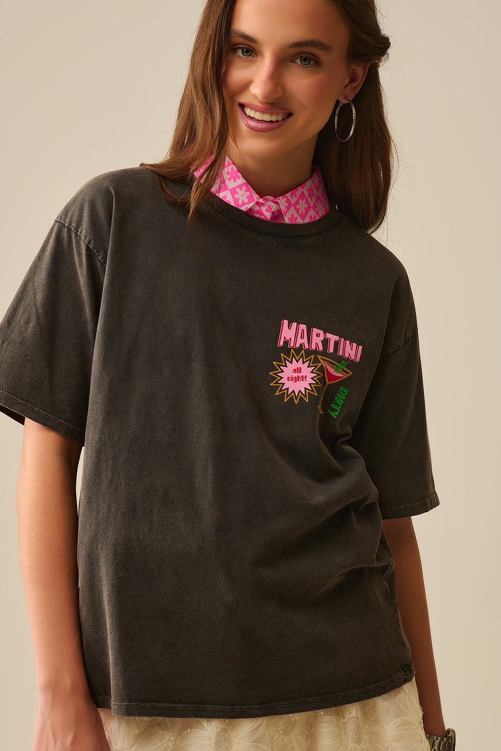 t-shirt noir stone wash fabriqué en Italie avec un logo graphique Martini