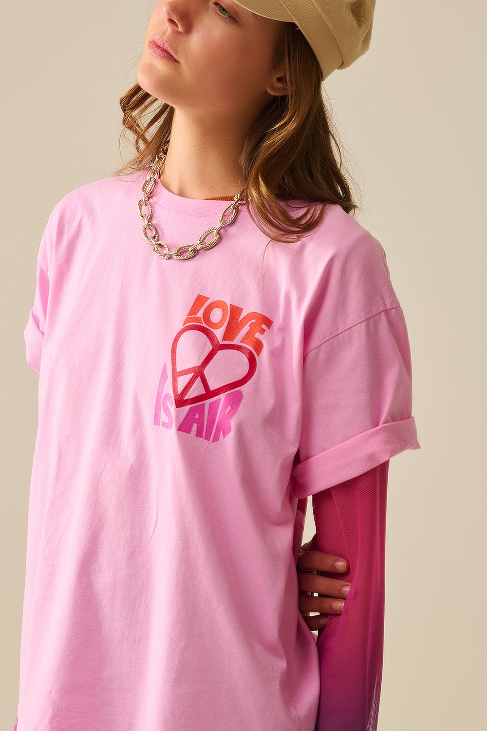 T-Shirt rose avec le logo Love is Air et Heart with Peace