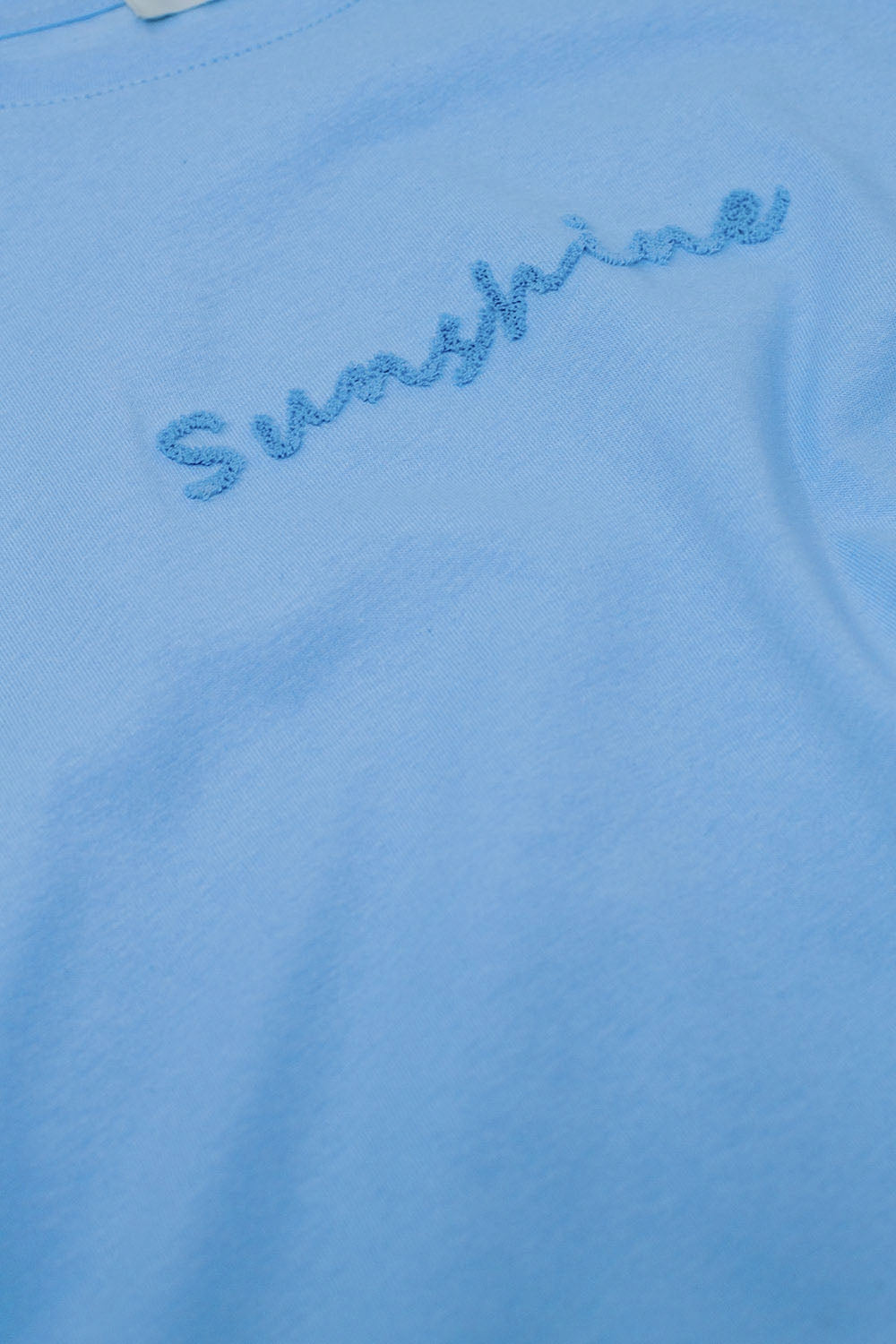 T-shirt surdimensionné Sunshine avec texte texturé à l'avant en bleu