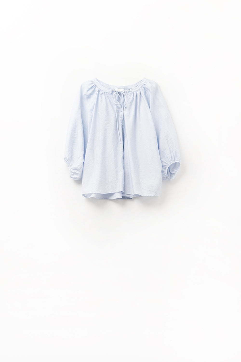 Top en chiffon bleu bébé avec manches bouffantes