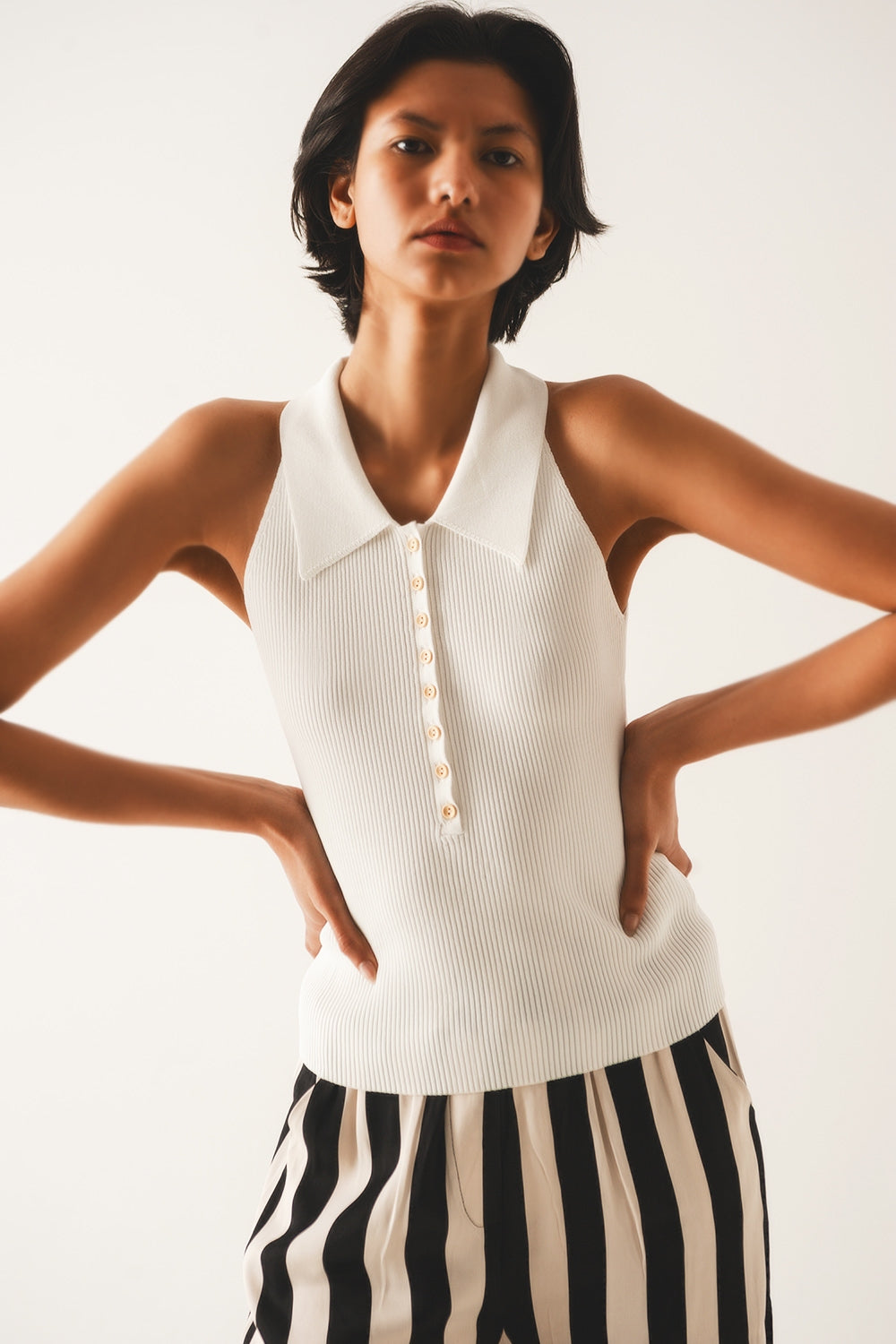 Top en maille côtelée à col polo en creme