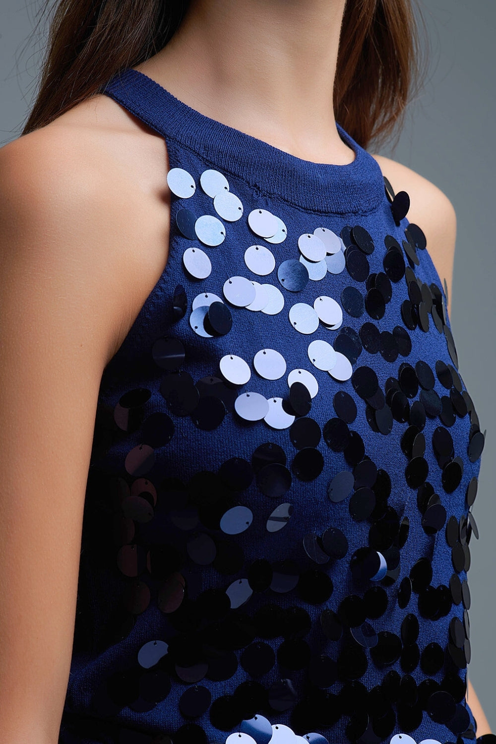 Top en tricot marine avec détails en paillettes