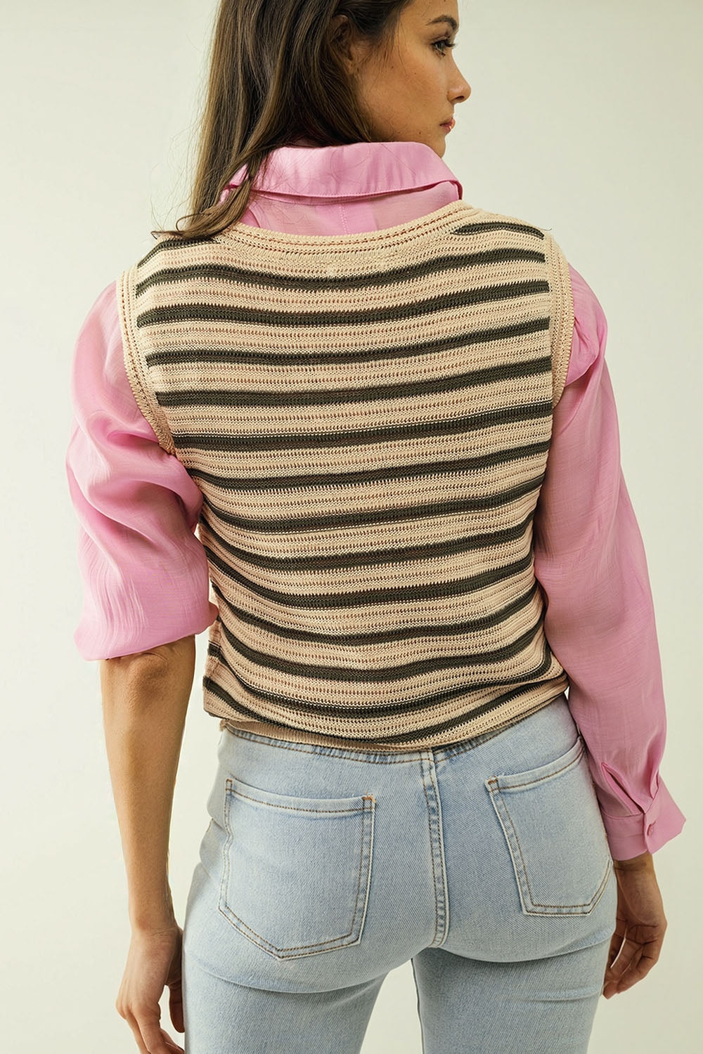 Top en tricot sans manches de couleur crème avec des rayures khaki