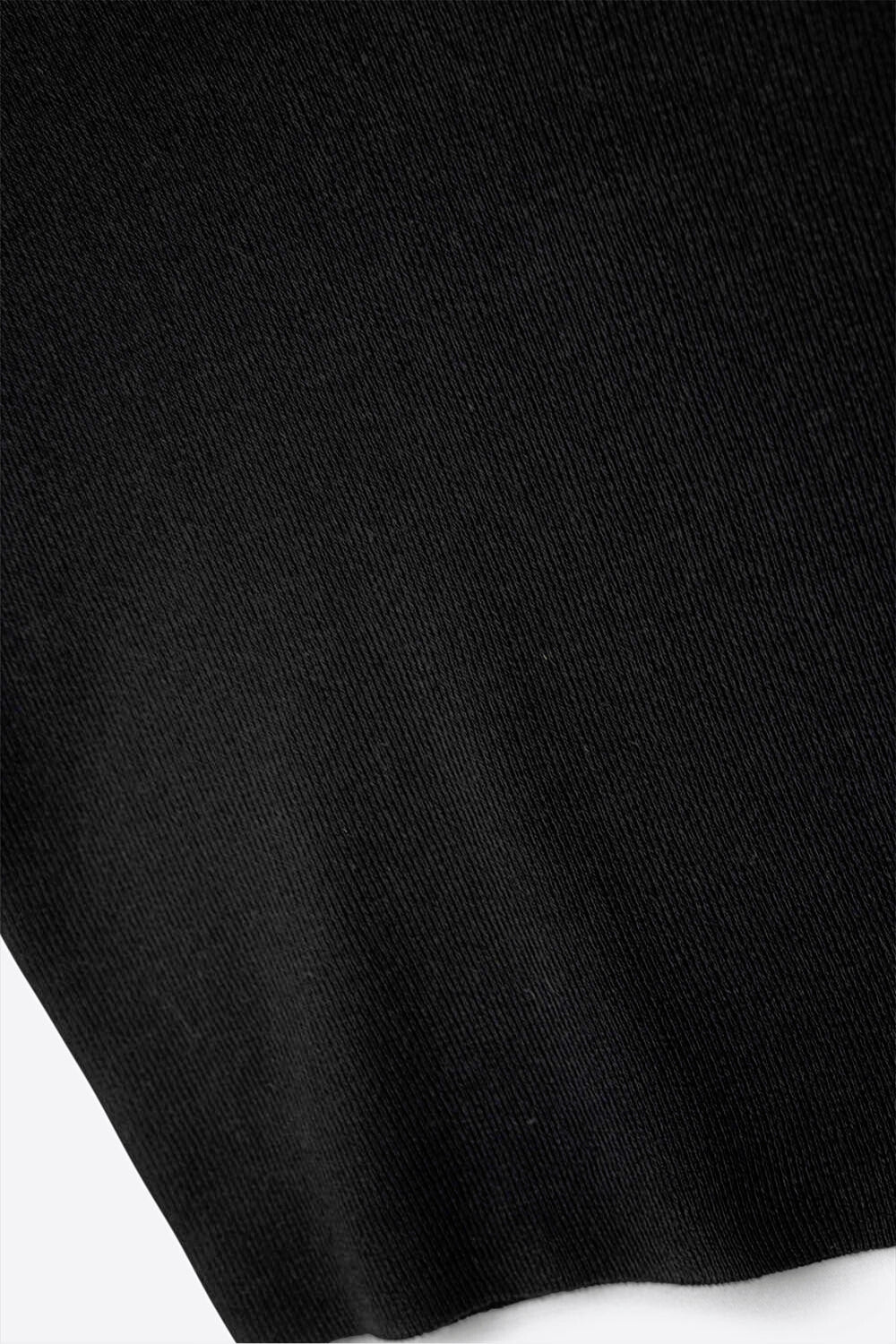 Top noir en tricot côtelé avec col en V et bretelles spaghetti