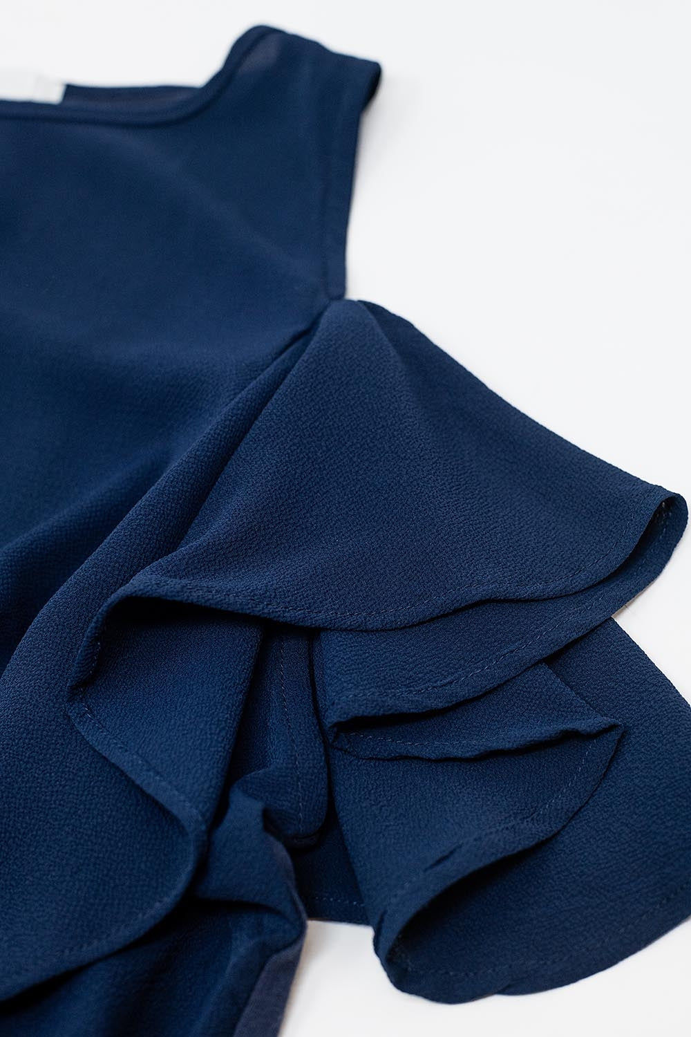 top sans manches à volants bleu marine