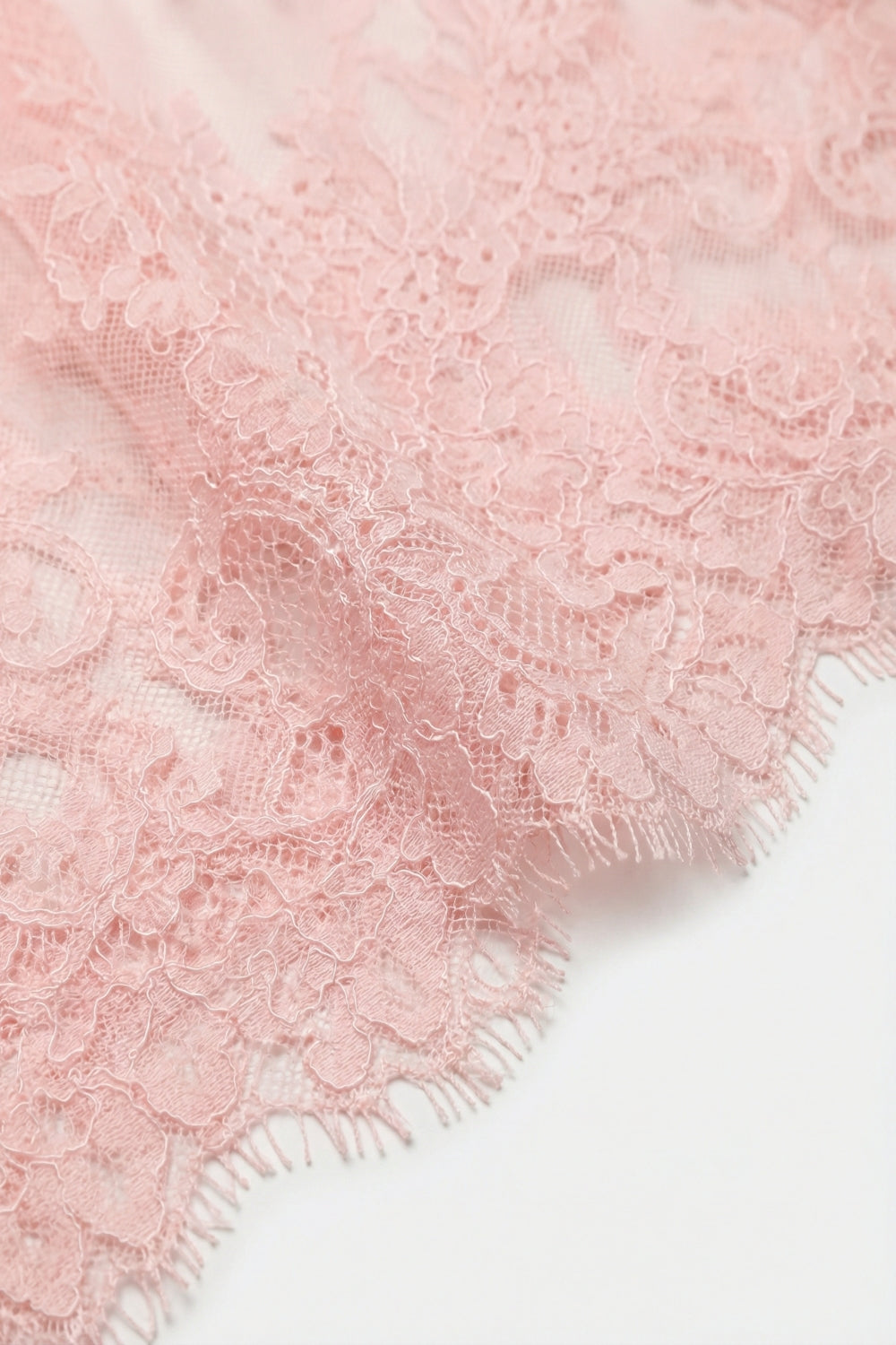 Top transparent à manches longues en dentelle rose avec détail floral
