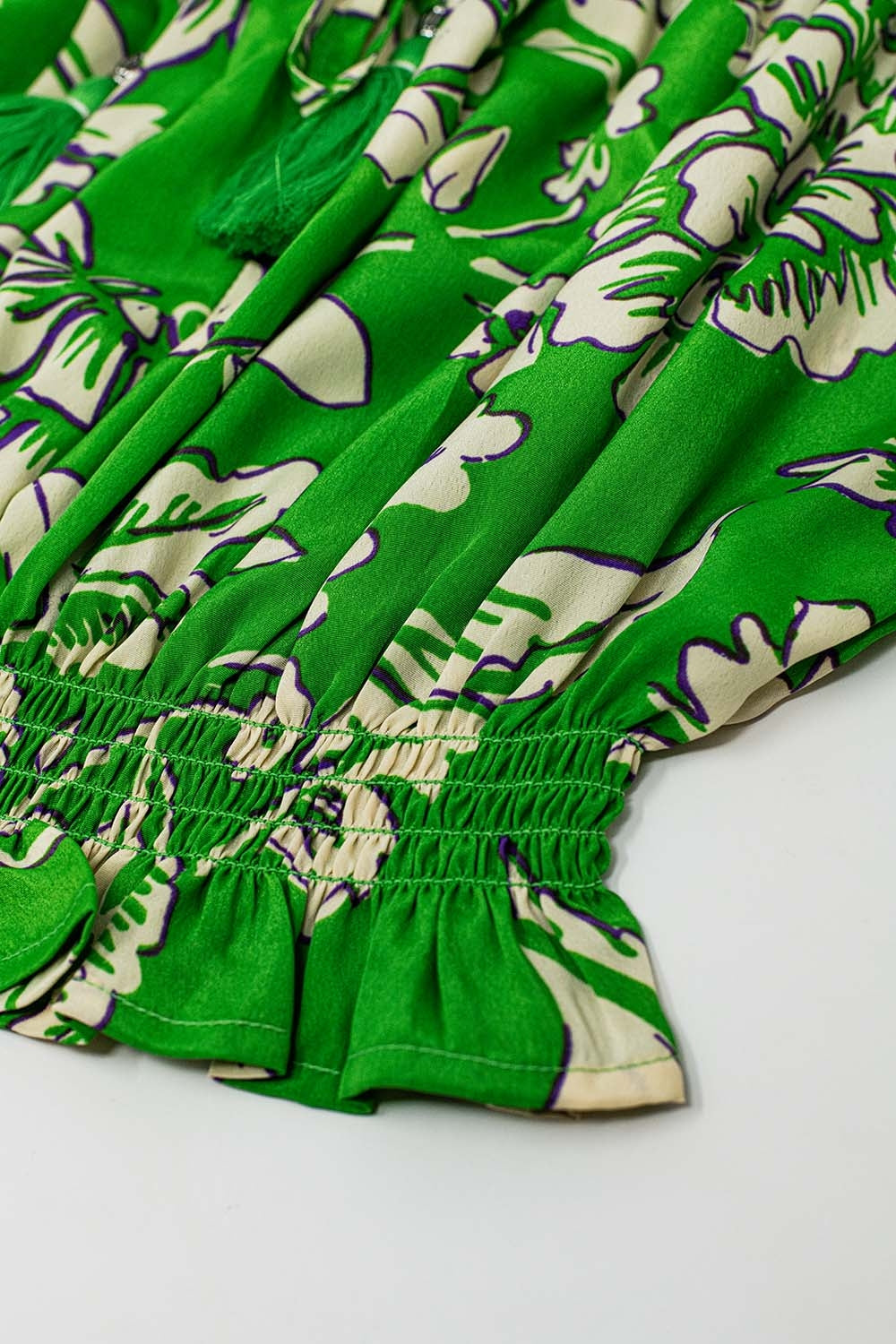 Top vert à taille élastiquée avec imprimé floral