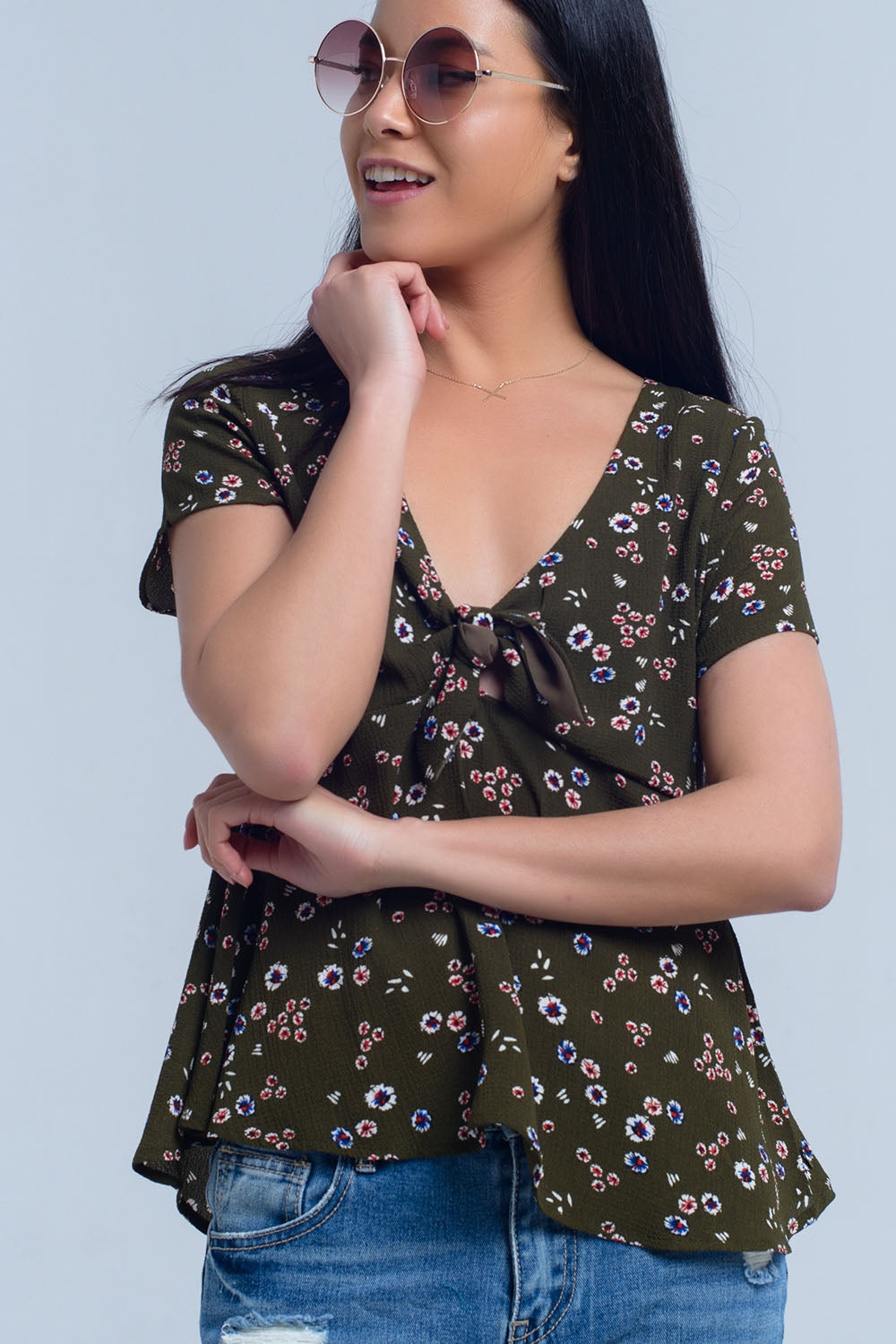 Top vert avec imprimé floral