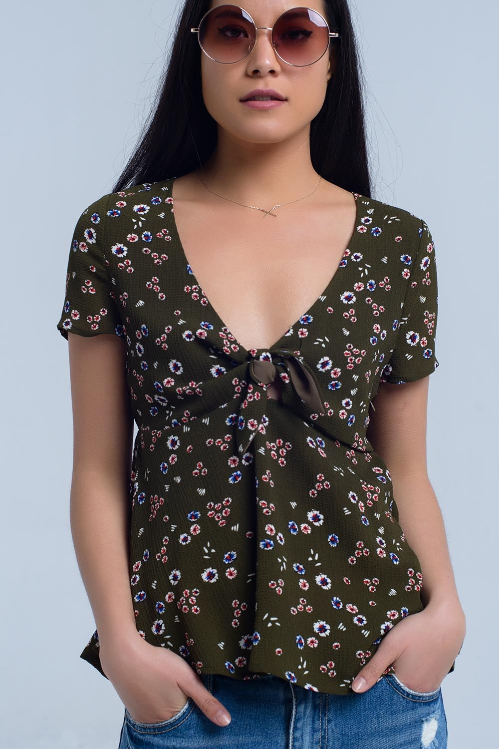 Top vert avec imprimé floral