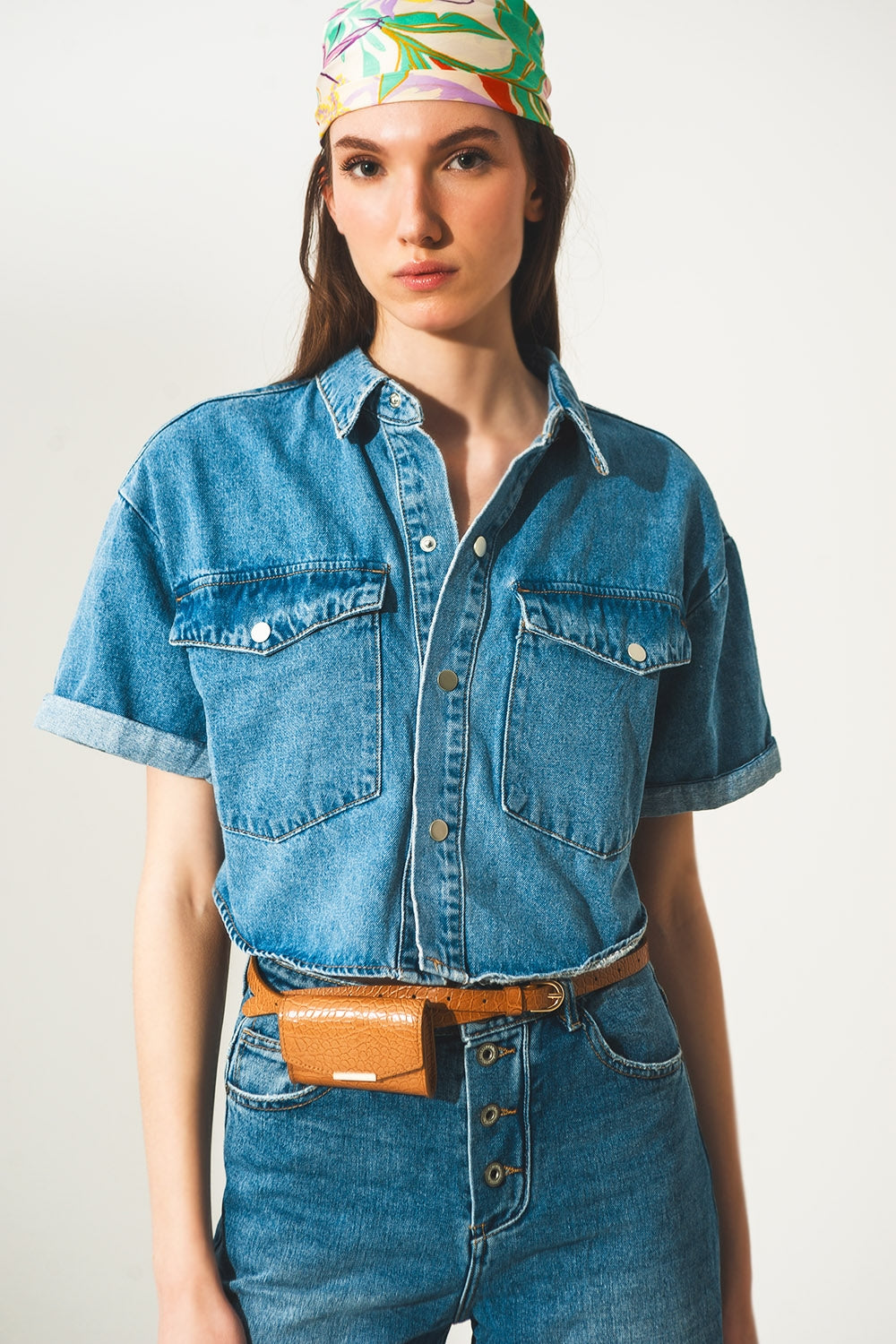 veste courte en denim bleu moyen