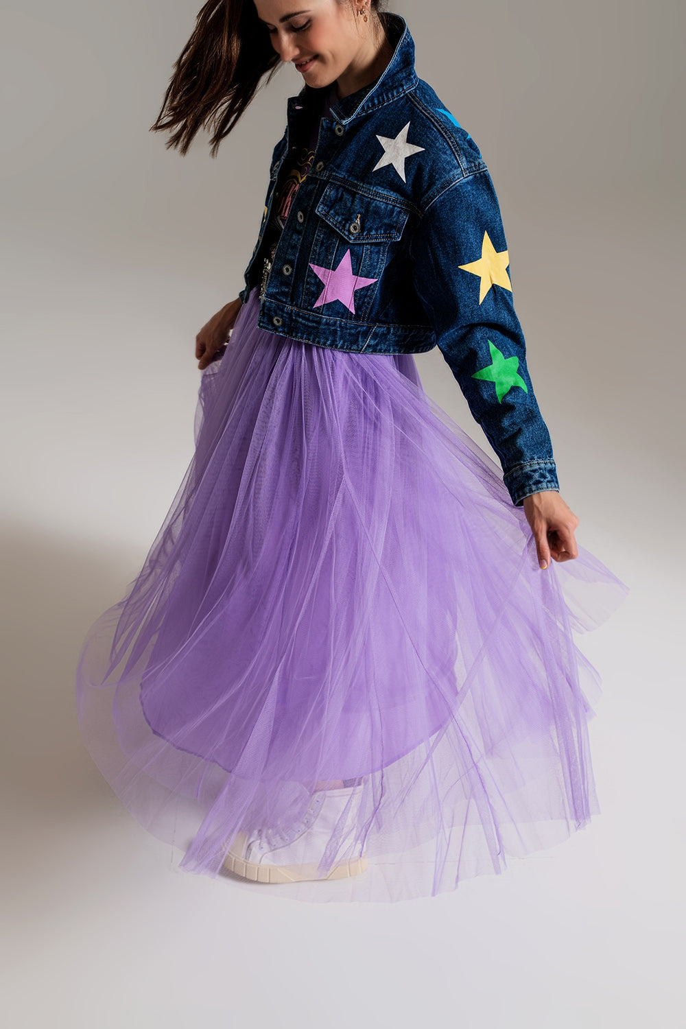 Veste en denim avec imprimé d'étoiles multicouleures