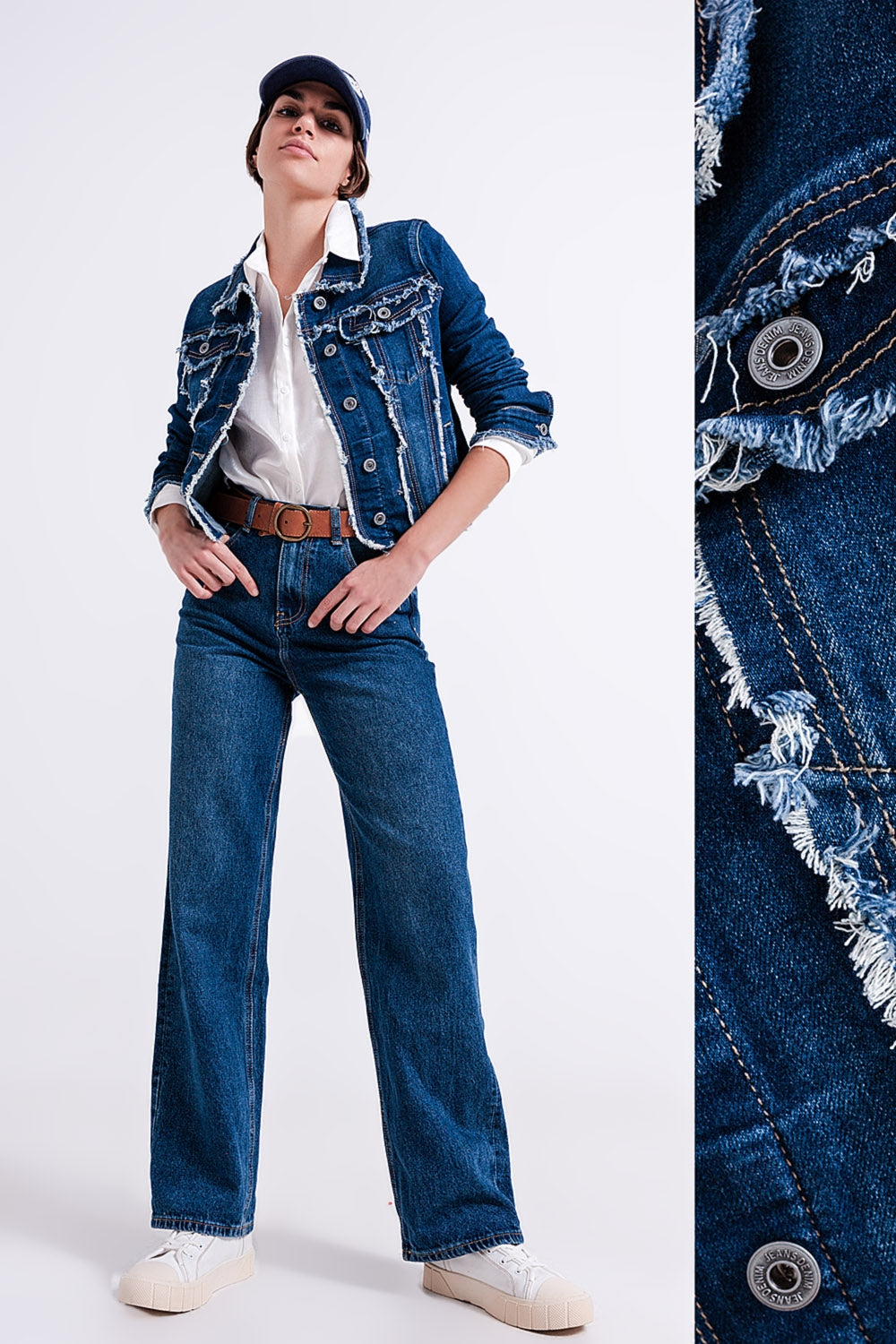 Veste en denim délavé avec motif effiloché et ourlet non fini