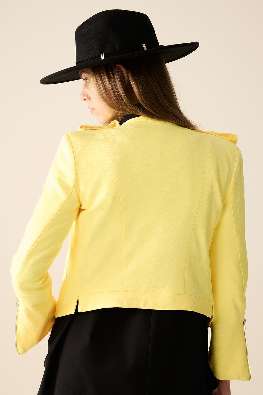 Veste jaune avec détails à fermeture éclair
