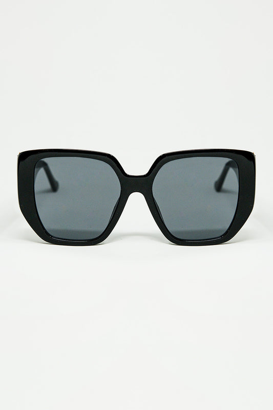 Lunettes de soleil noires de style pin-up avec motif géométrique et yeux de chat