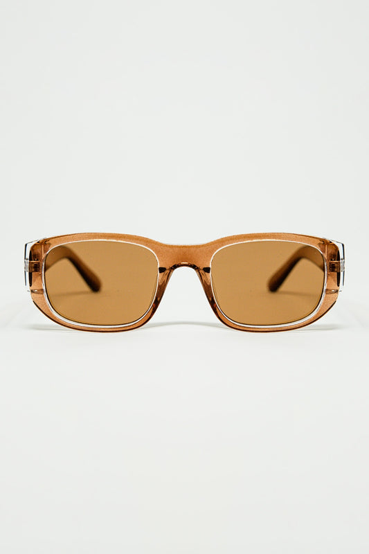 Lunettes de soleil ovales avec montures Camel transparentes et brillantes