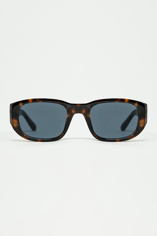 Lunettes de soleil ovales avec monture transparente haute brillance en marron