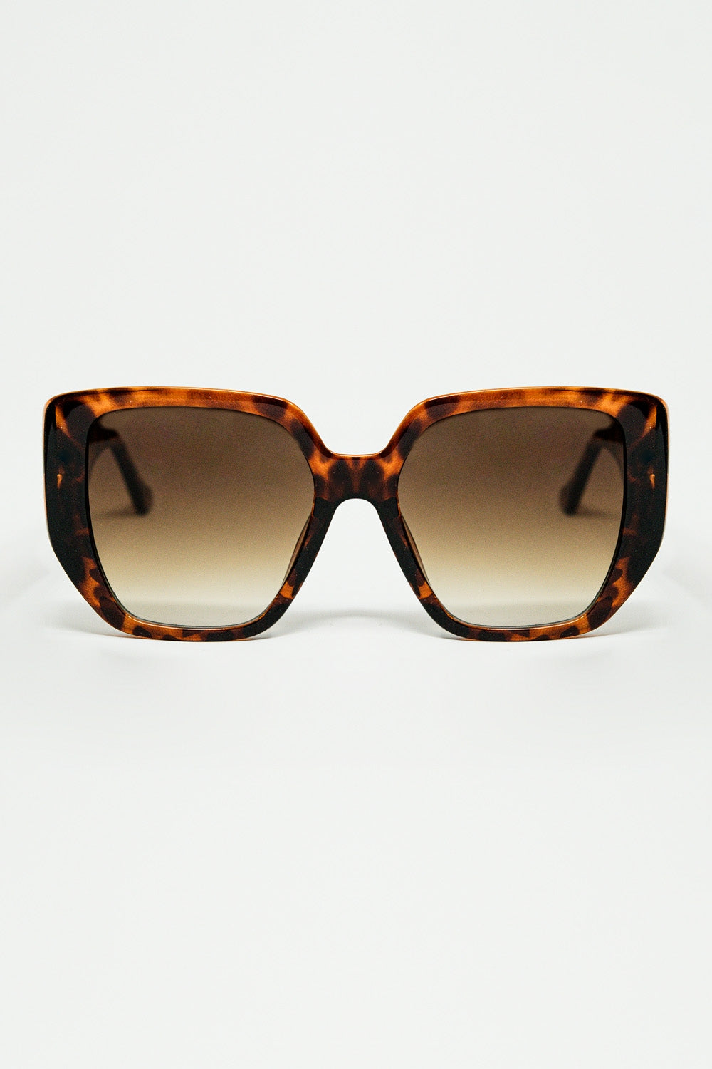 Lunettes de soleil marron de style pin-up avec motif géométrique et yeux de chat
