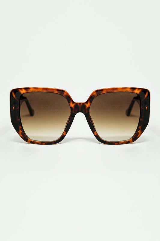 Lunettes de soleil marron de style pin-up avec motif géométrique et yeux de chat
