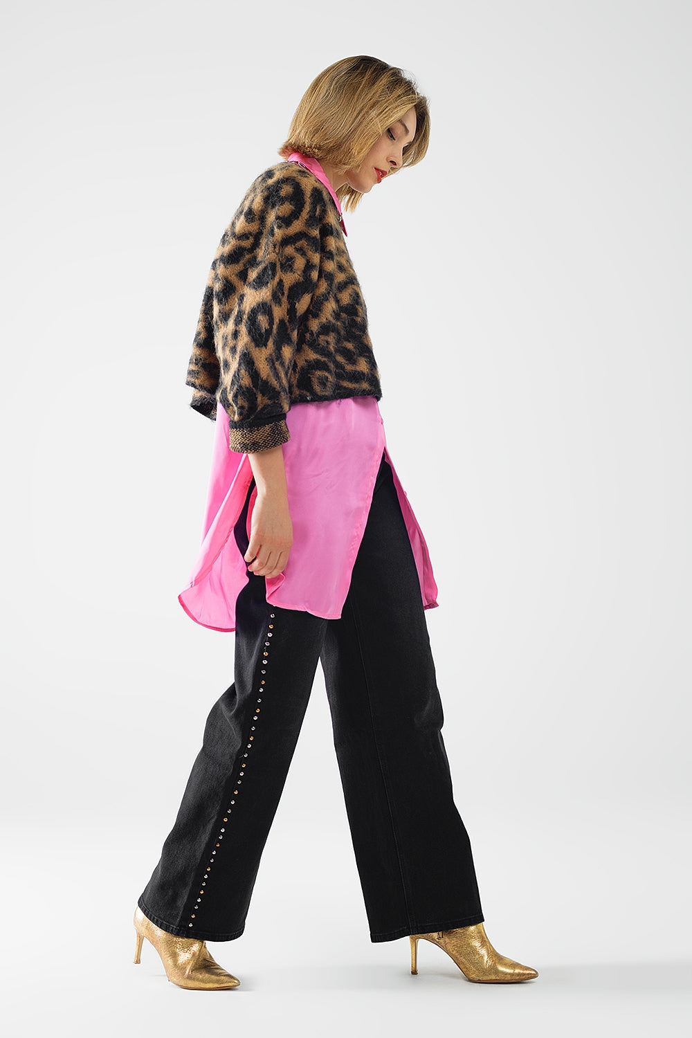 pull noir imprimé léopard en tissu tricoté avec de la laine
