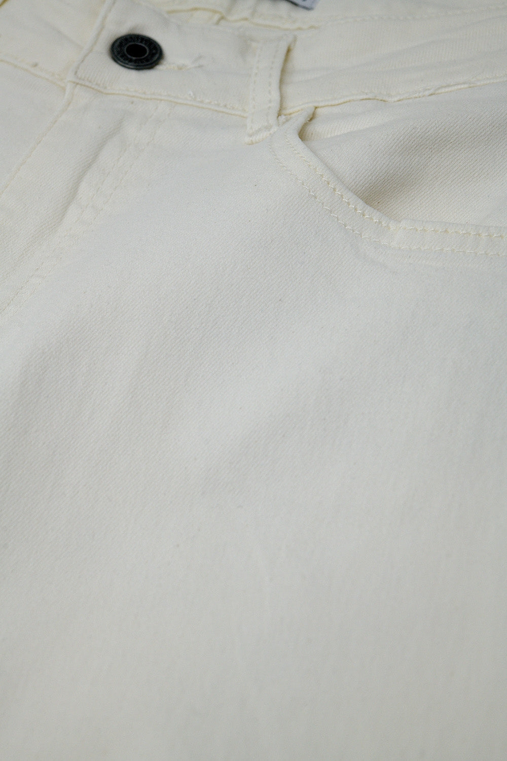 Pantalon large crème avec imprimé léopard en bas
