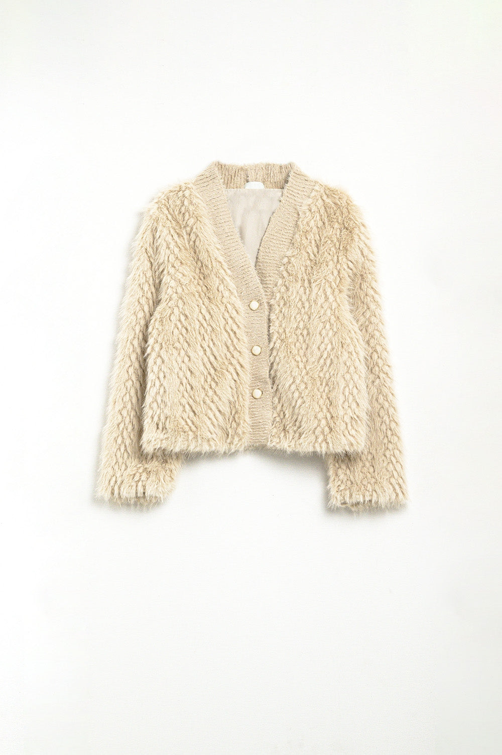 Veste courte en fourrure fine beige