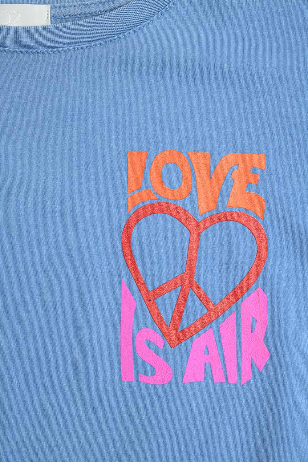 T-Shirt bleu fabriqué en Italie avec le logo Love is Air et Heart with Peace