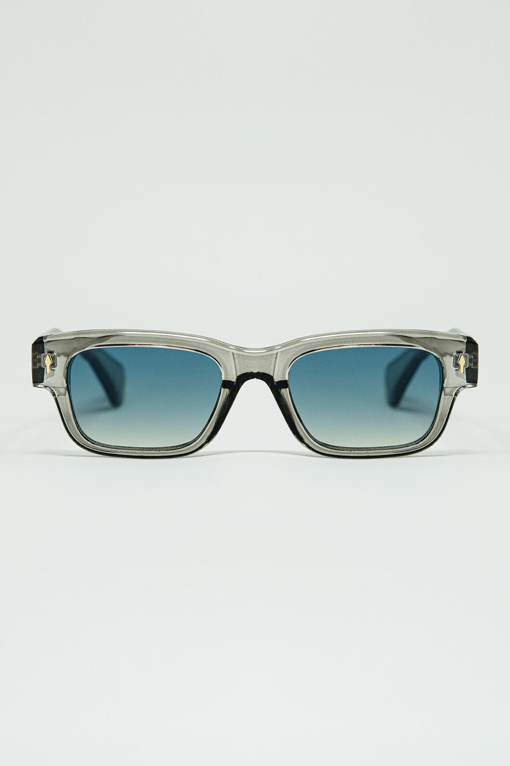 Lunettes de soleil grises translucides avec monture ovale