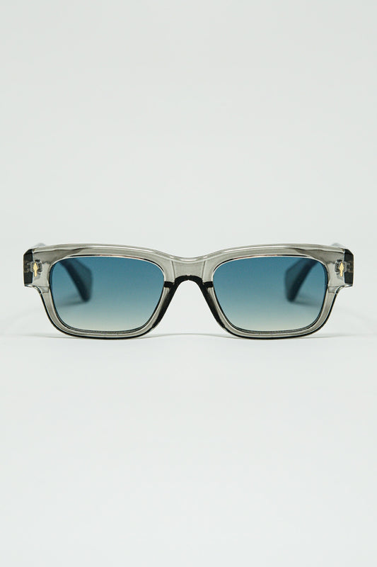Lunettes de soleil grises translucides avec monture ovale