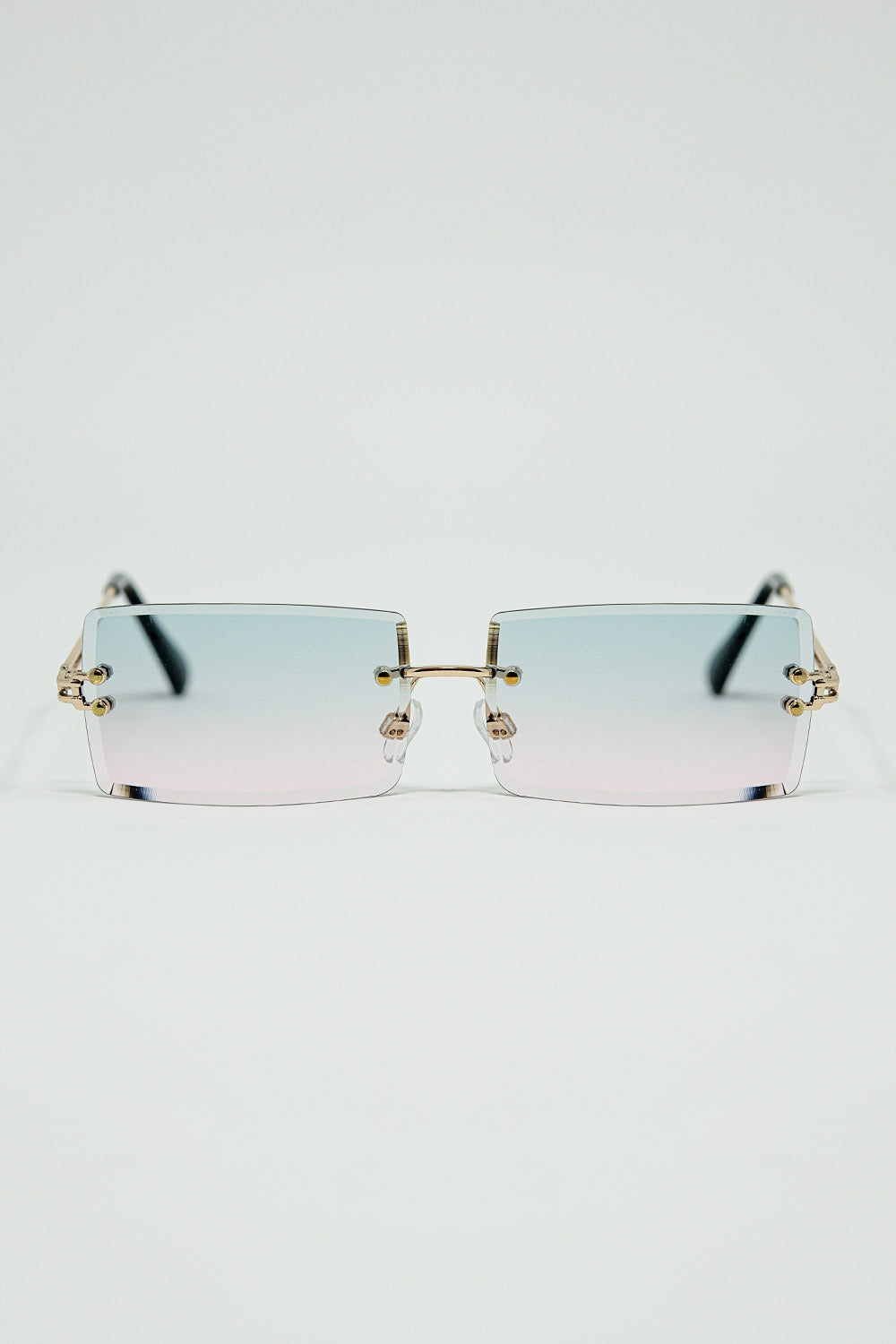 Lunettes de soleil carrées dorées à monture fine avec verres dégradés turquoise et rose