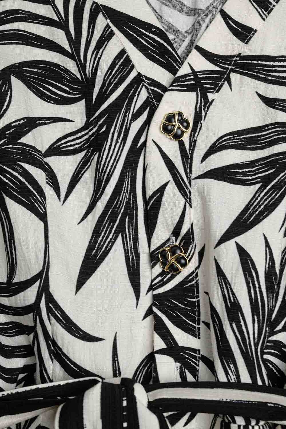 Combinaison à manches courtes avec motif tropical en noir et blanc