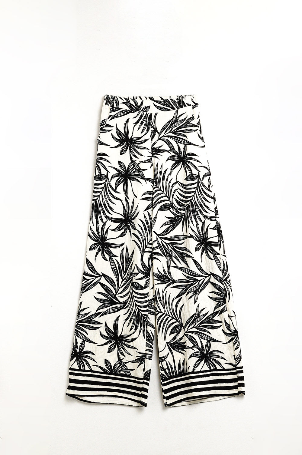 Pantalon à jambes larges en blanc avec détails floraux en noir