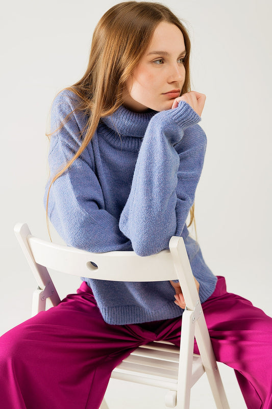 Pull bleu ample à manches tombantes