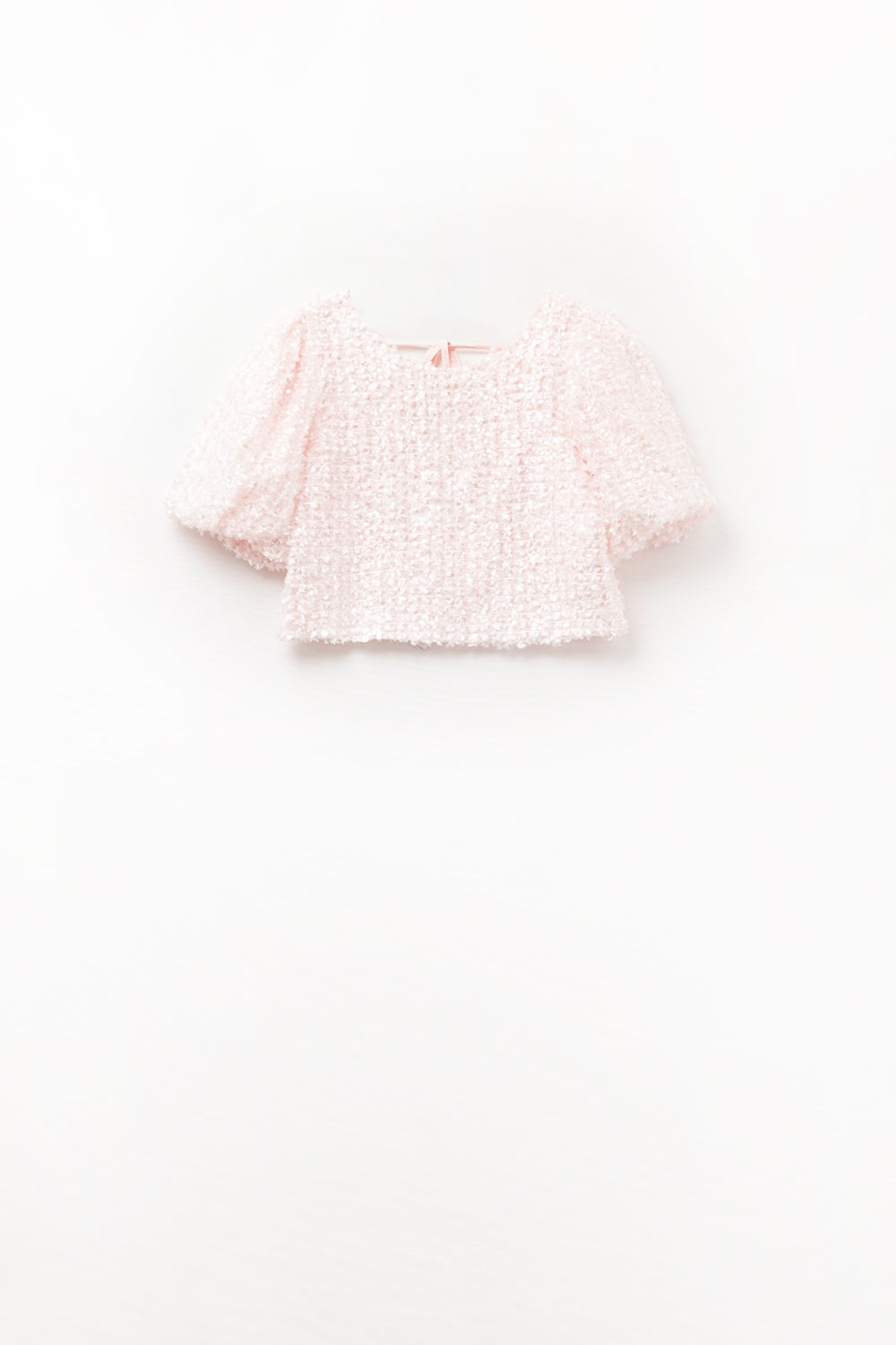 Top rose avec des détails en sequins et des manches bouffantes