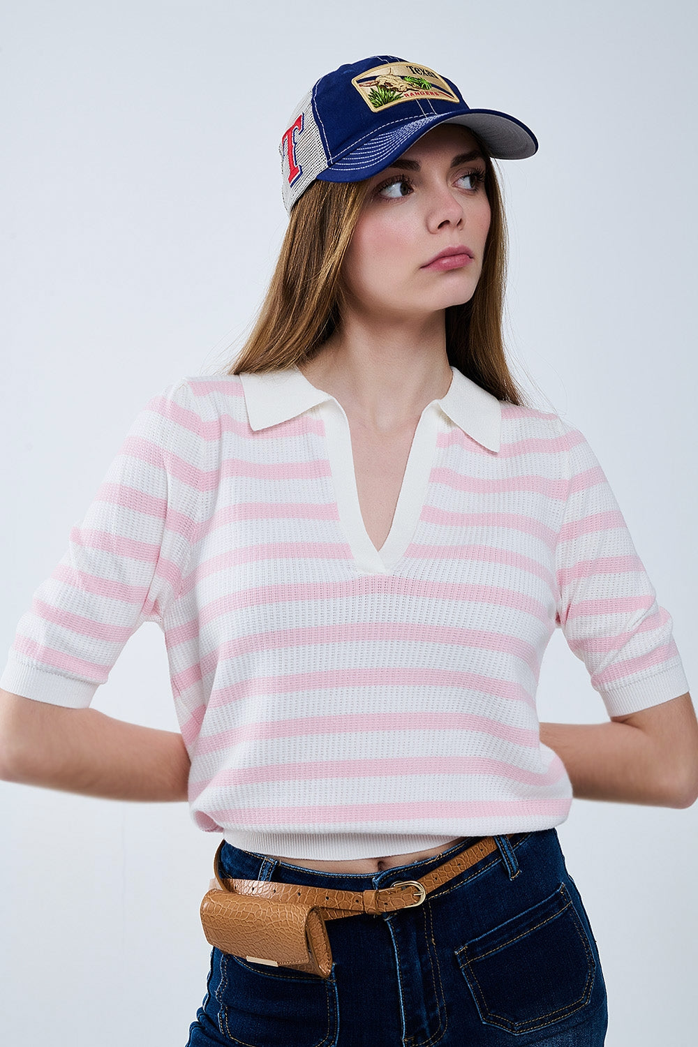 Polo blanc à rayures roses