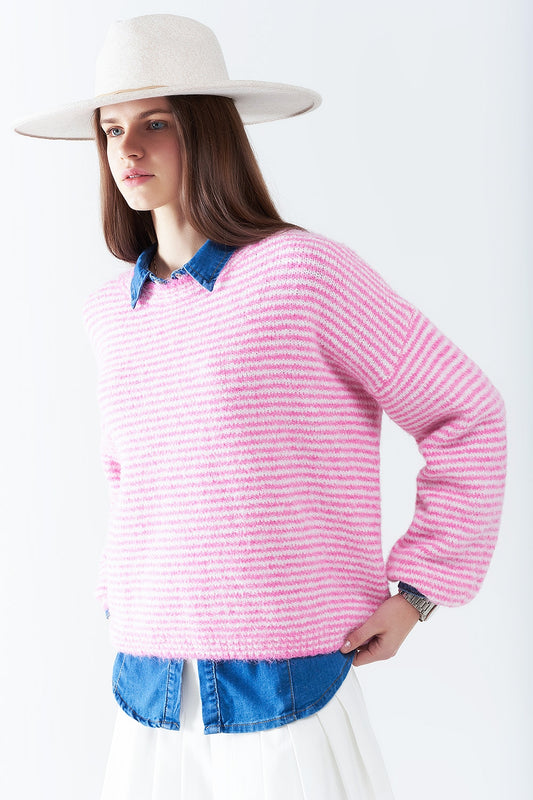 Pull en rose à rayures blanches