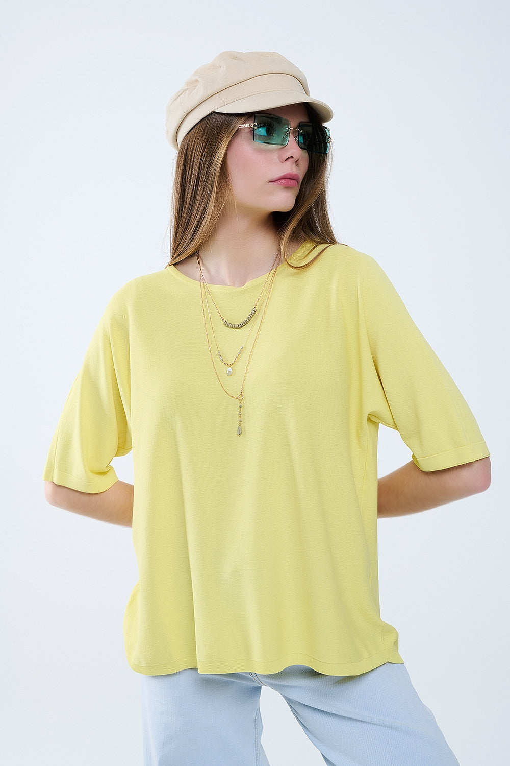 pull jaune surdimensionné avec manches coudées