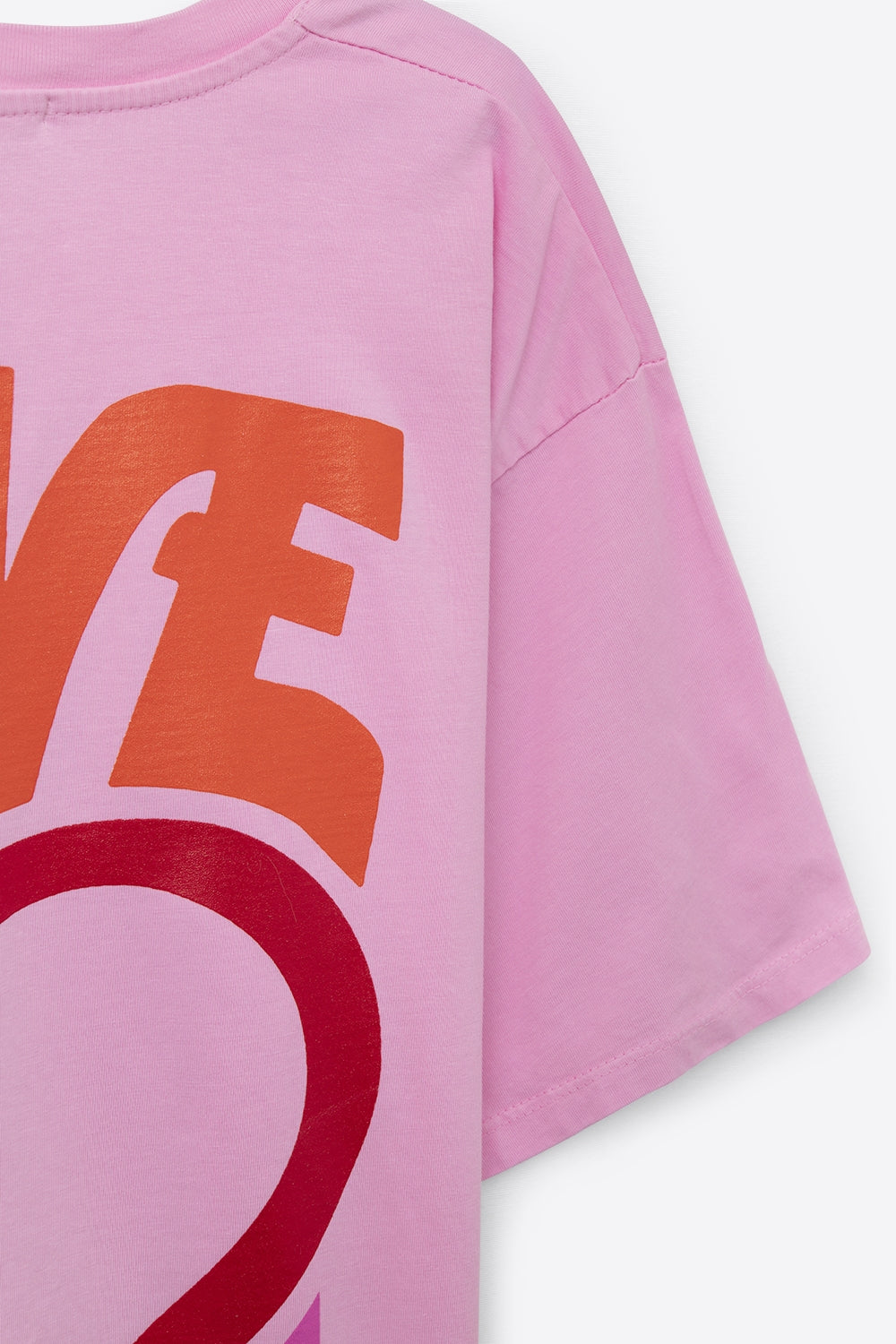 T-Shirt rose avec le logo Love is Air et Heart with Peace