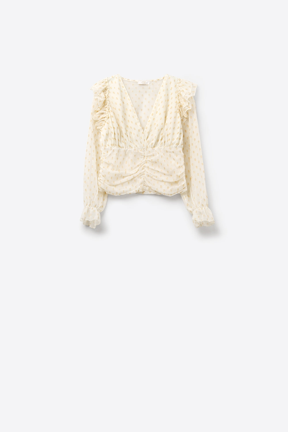 Chemisier beige à pois dorés et à volants