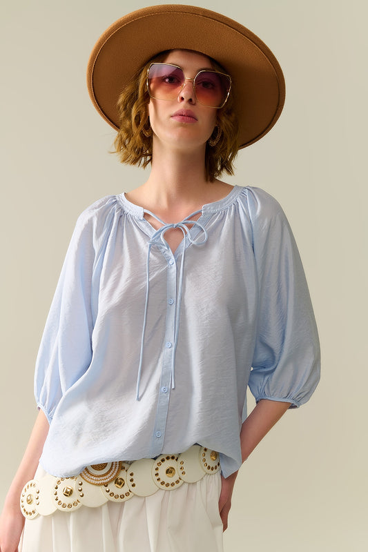 Top en chiffon bleu bébé avec manches bouffantes