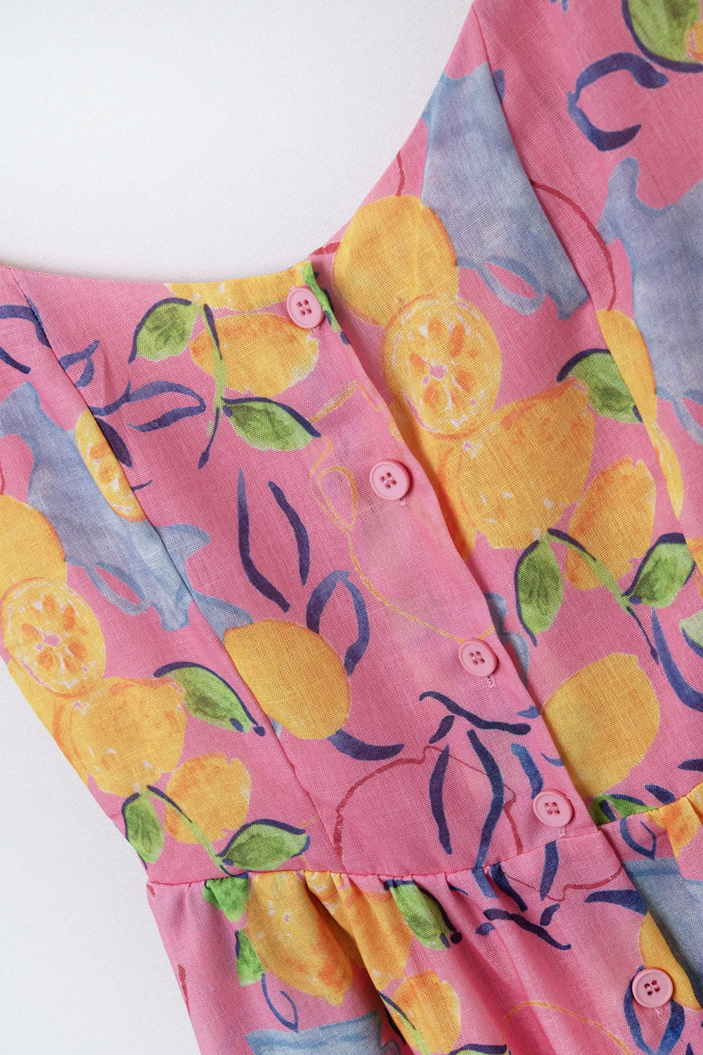 Robe maxi rose sans manches avec imprimé citron