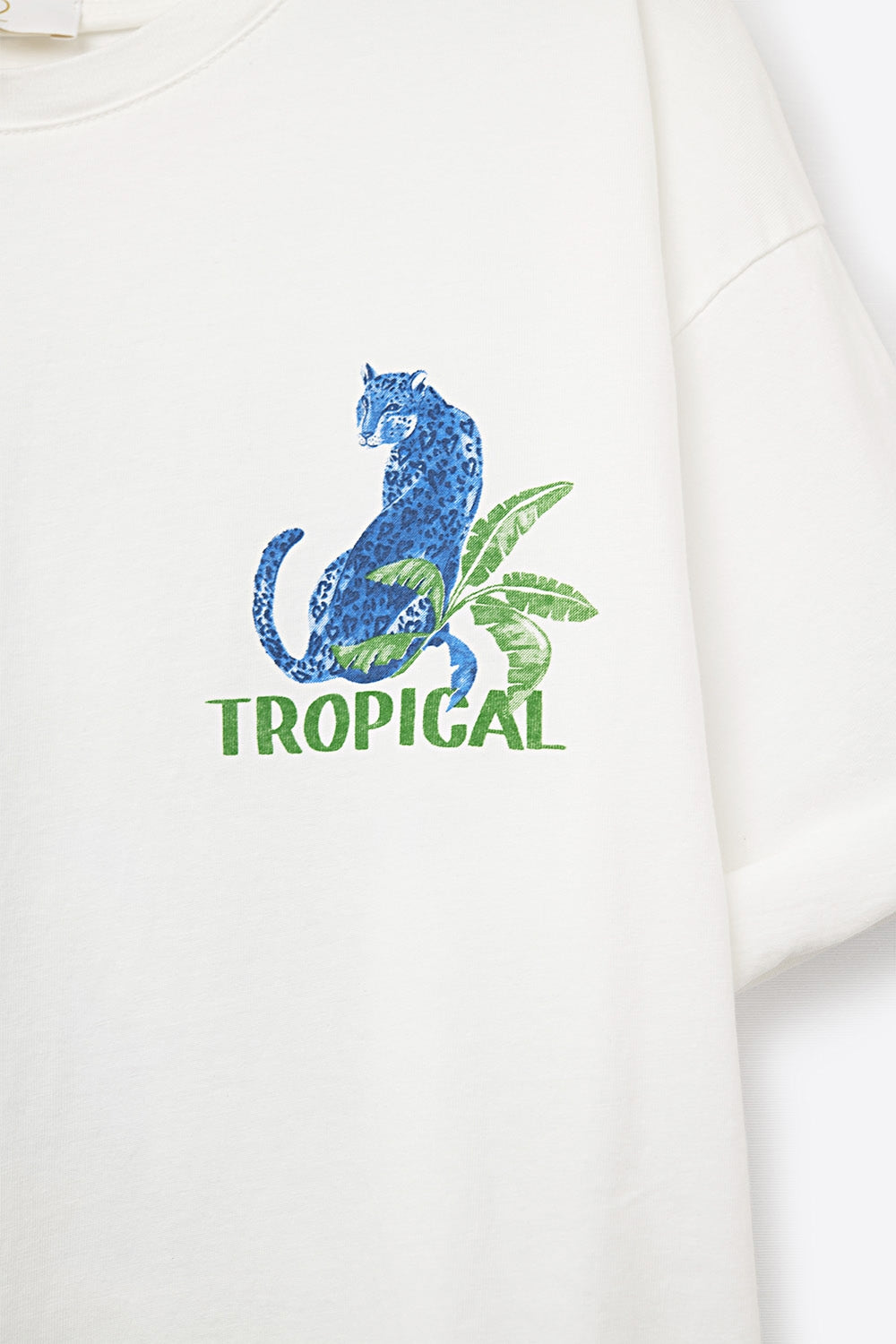 T-shirt blanche fabriquée en Italie avec imprimé graphique tropical