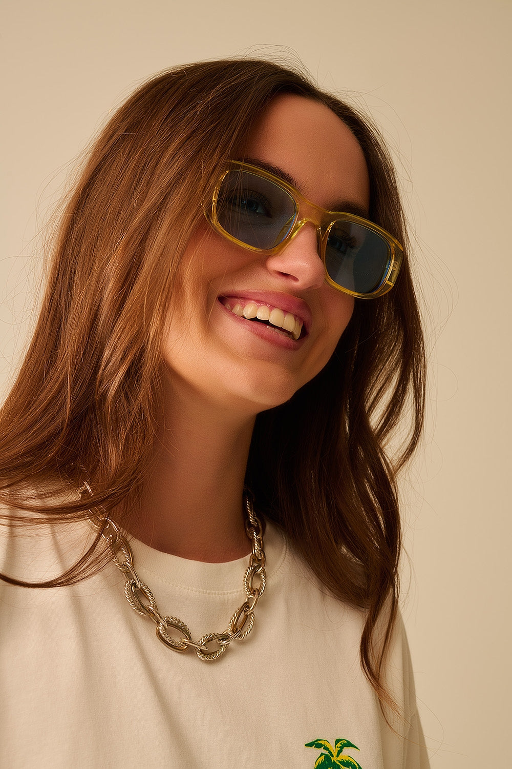 Lunettes de soleil ovales avec monture transparente haute brillance en jaune