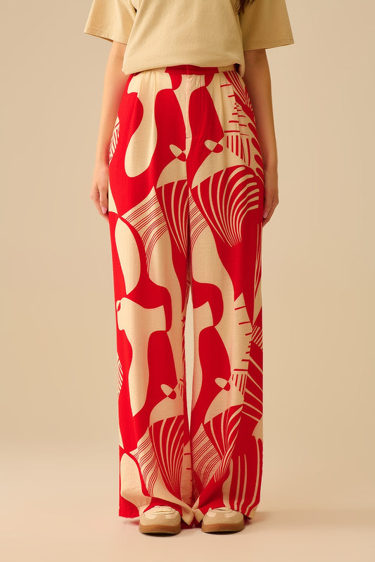 Pantalon large rouge à imprimé abstrait