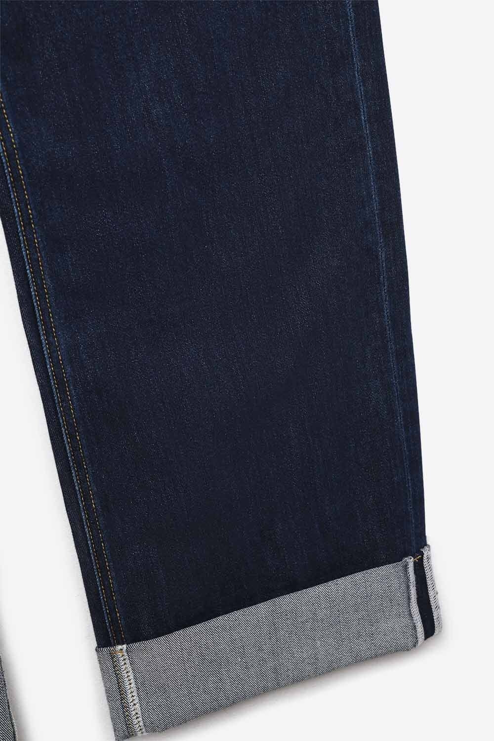 Jeans à taille haute bleu foncé à jambe large et ourlets repliés